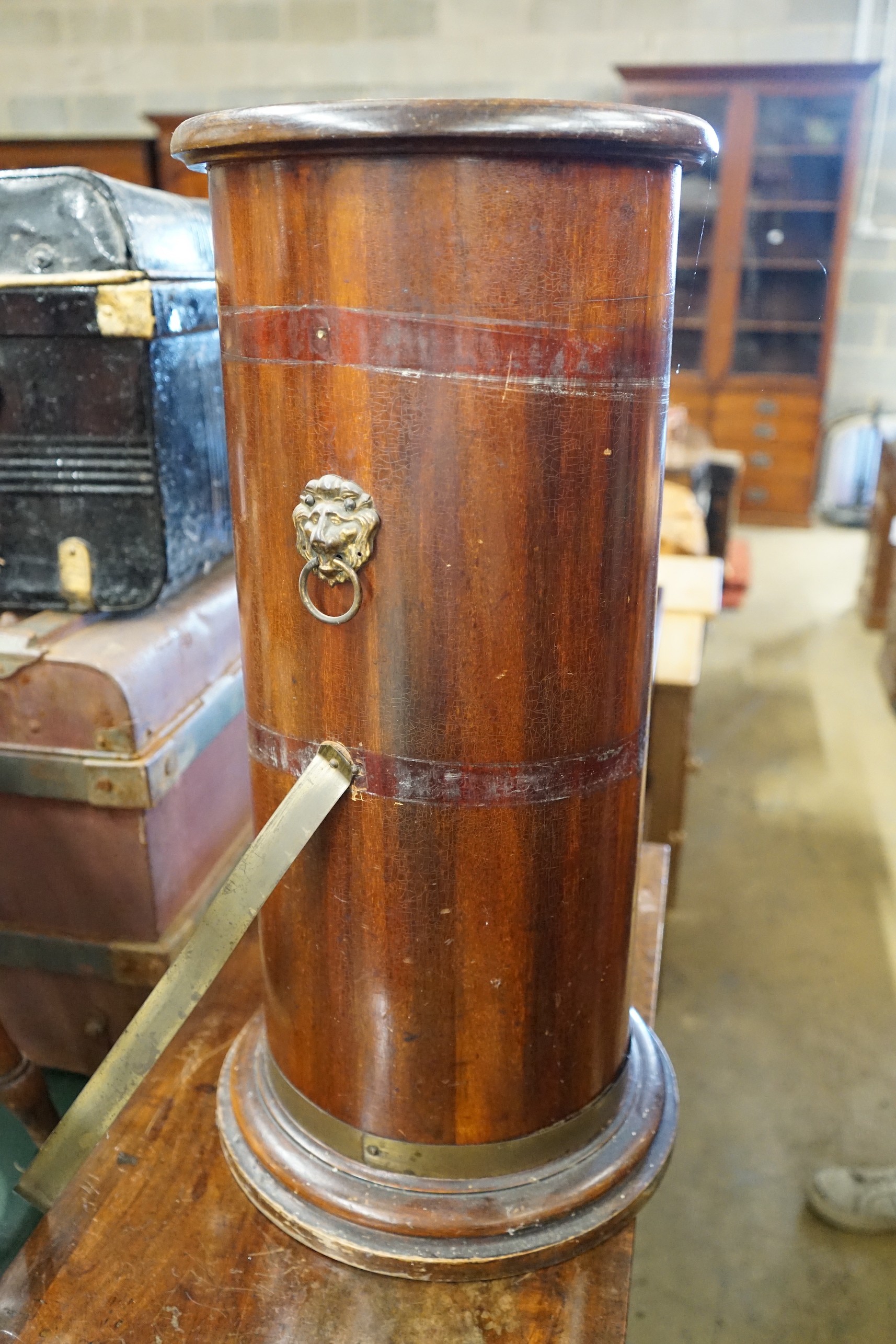 A late Victorian cylindrical mahogany stick stand with liner, diameter 29cm, height 66cm